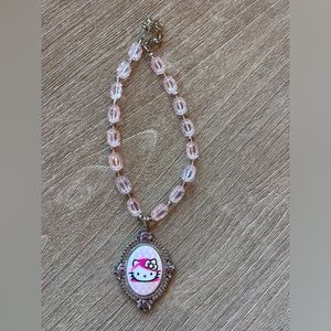 Trina Tarantino Hello Kitty pink necklace.
